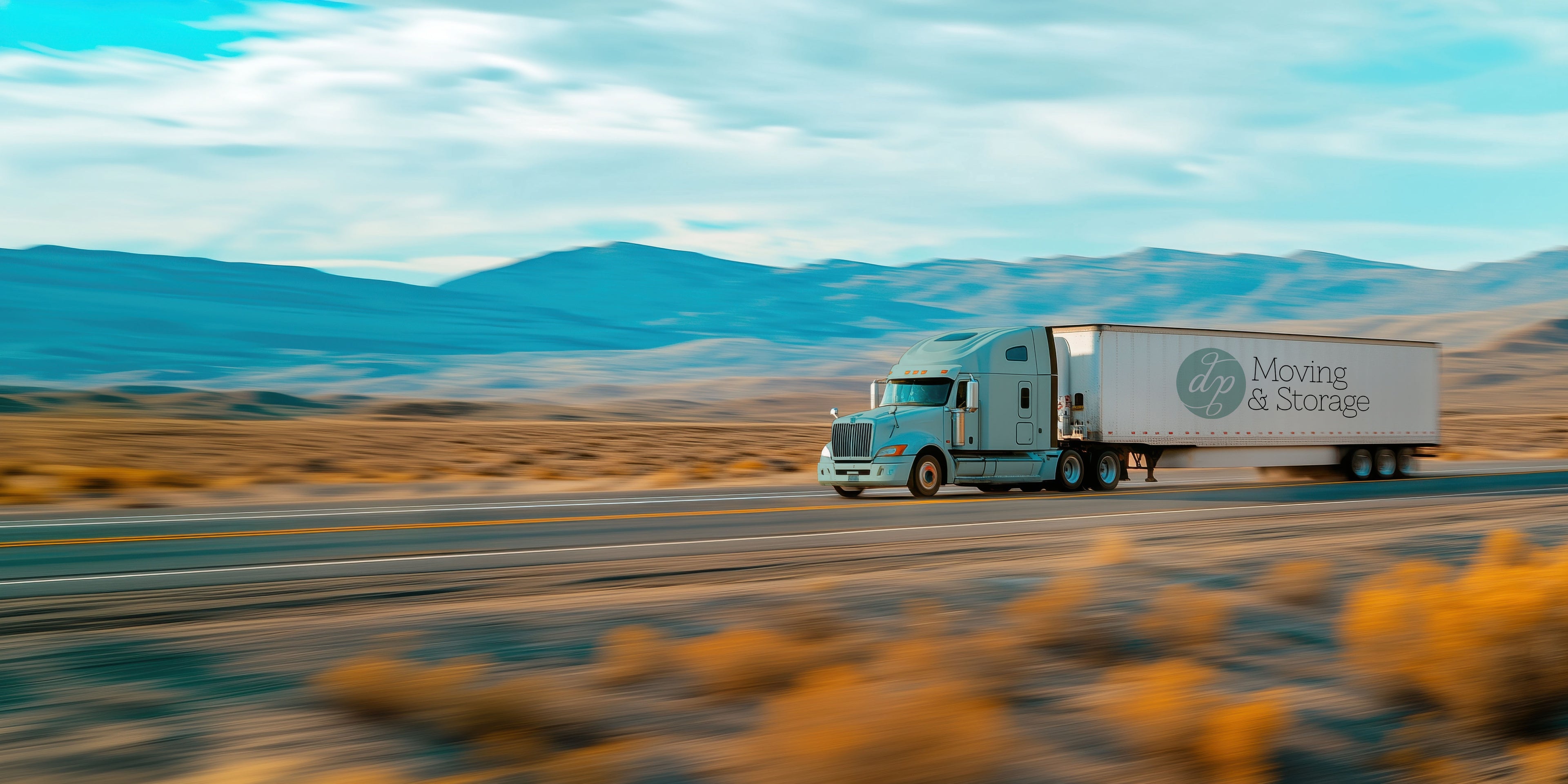 DP Moving & Storage long-distance moving truck driving en route across state lines in the United States
