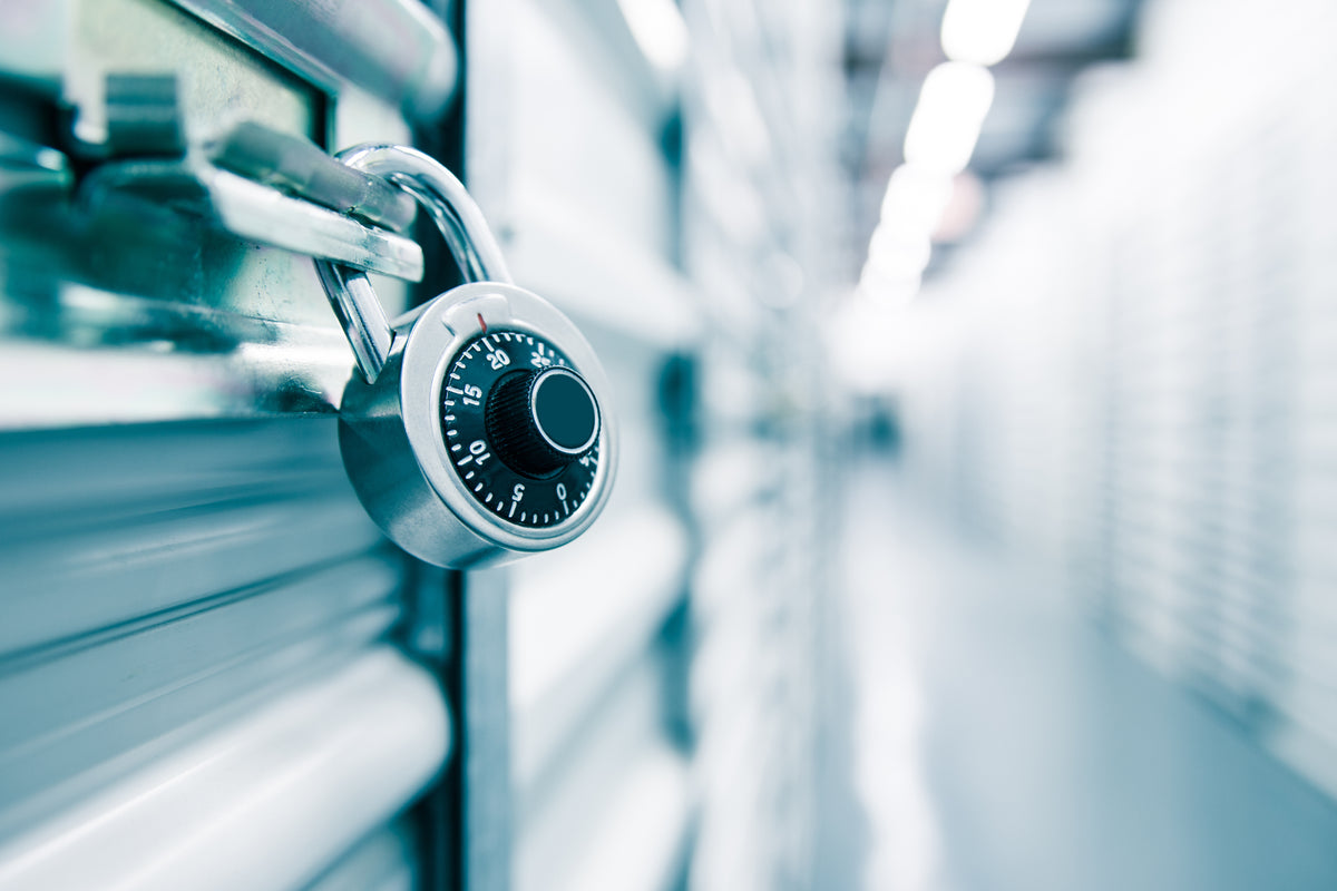 A close-up of a lock on an indoor storage door