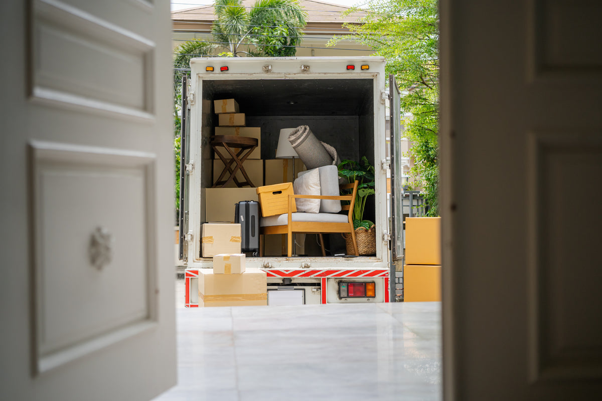 A moving truck ready outside a home